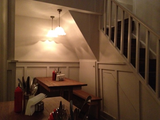 table for four under the stairs at pittcue soho