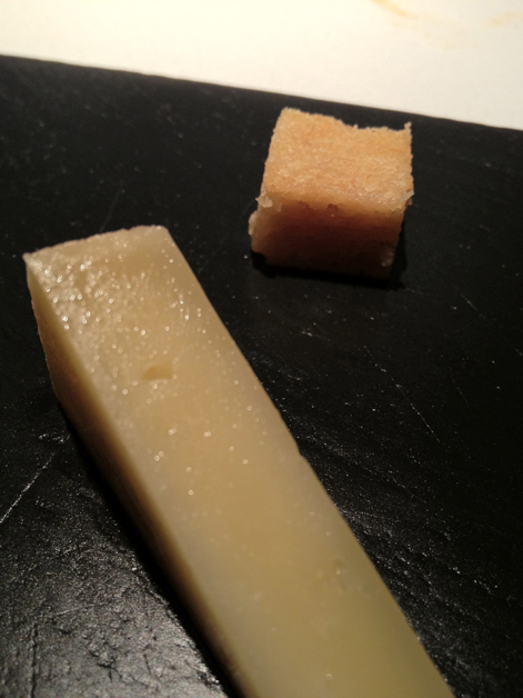 firm cow's milk cheese with almond cake at cinc sentits