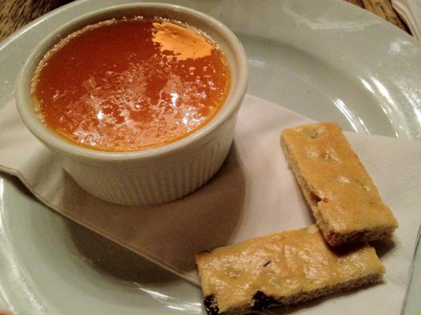 earl grey tea pudding with orange syrup and garibaldi biscuits at the old dairy