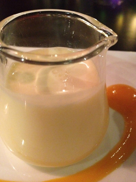 ginger custard accompanying the bread and butter pudding at carom
