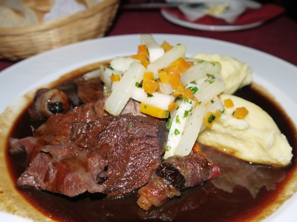 ox cheeks and stewed prunes wrapped in bacon at renger patzsch