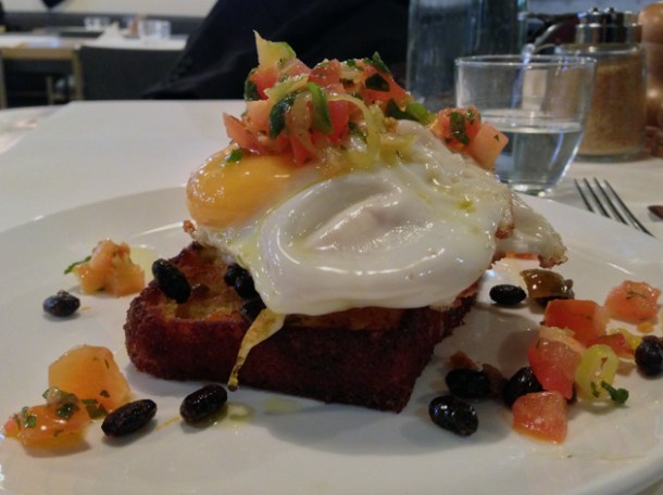 jalapeño corn bread, fried eggs, black beans and pepper at caravan kings cross