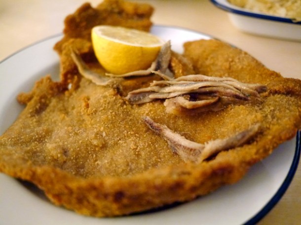 wiener schnitzel topped with anchovies at boopshi's