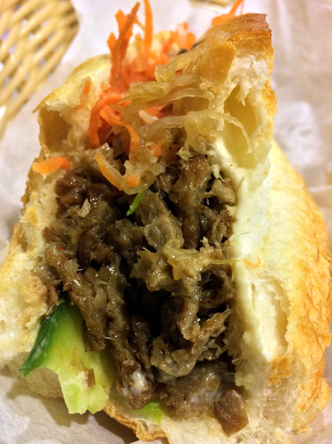 close up of mock roast pork banh mi at aobaba elephant and castle
