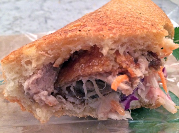 close-up of crackling pork belly banh mi at bep haus