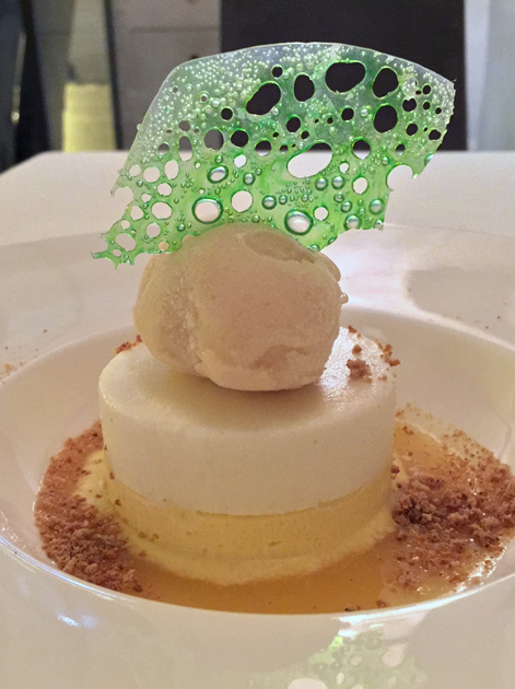 mango semifreddo with iced pineapple, peach sorbet and amaretti biscuit crumbs at antico arco