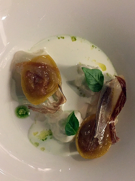 dried cherry tomato ravioli, buffalo mozzarella and prosciutto in mascarpone sauce at metamorfosi
