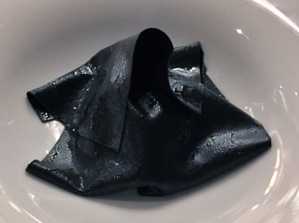 squid ink skin ravioli at metamorfosi