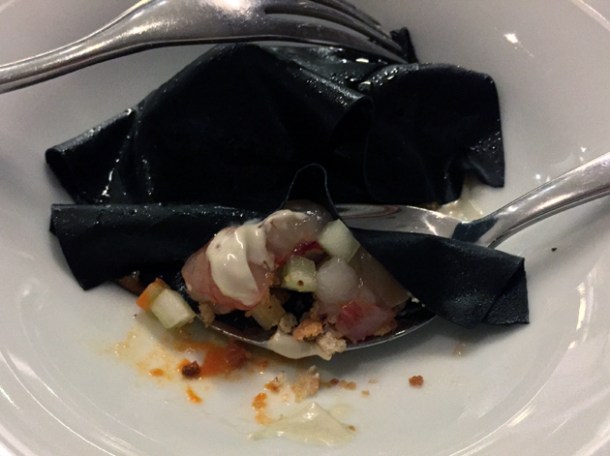 squid ink skin red prawn ravioli at metamorfosi