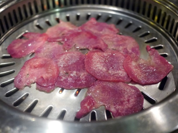 beef tongue on the grill at jin go gae
