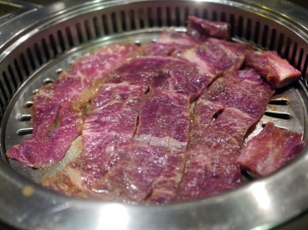 kalbi beef short rib on the grill at at jin go gae
