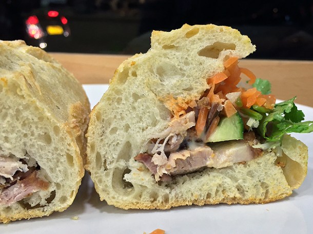crispy pork belly banh mi at carrots and daikon