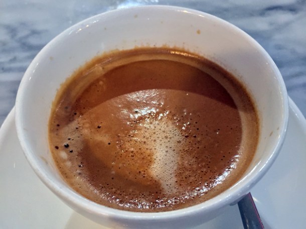 flat white coffee at the perfectionists' cafe heathrow terminal 2