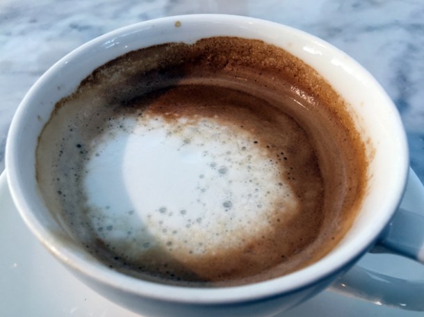 flat white coffee at the perfectionists' cafe