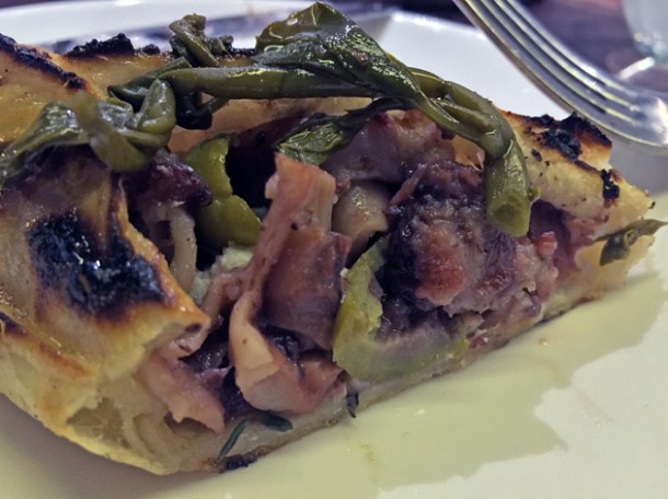 close up of octopus, ricotta and caper pide at oklava shoreditch