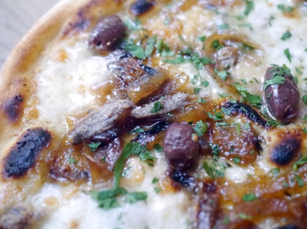 anchovies and olives pizza at homeslice