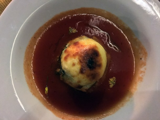 mushroom filled cheese ball in tomato sauce at tierra y cielo