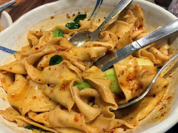 biang biang noodles in chilli sauce with bok choy at xi'an impression