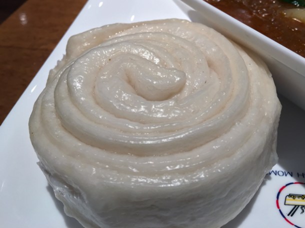 lamb stew's rice flour bun on the side at kailash momo