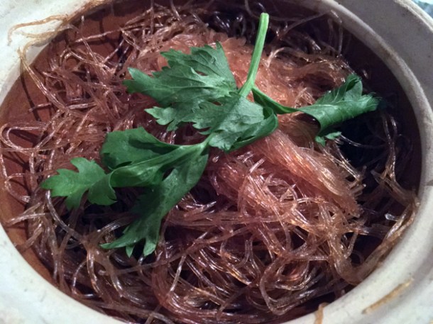 baked glass noodles with pork belly and brown crab meat at kiln