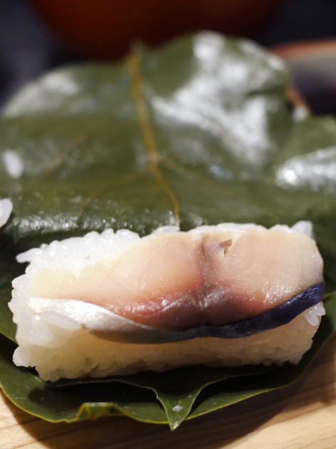 persimmon wrapped mackerel sushi nigiri roll at hiraso nara