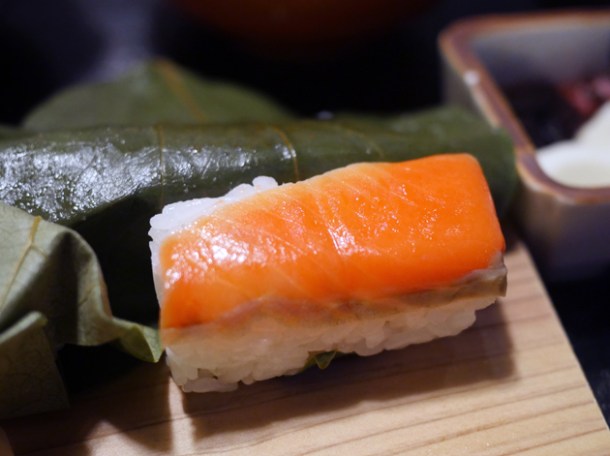 persimmon wrapped salmon sushi nigiri roll at hiraso nara