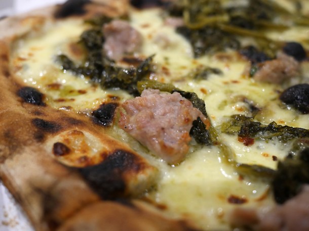 salsicca and friarielli pizza from rust bucket at street feast woolwich public market