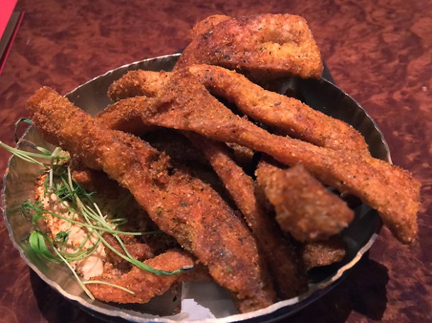 pork scratchings with cod roe raita at brigadiers