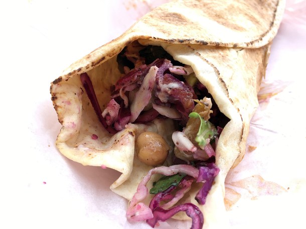illustrative photo of the aubergine, chickpea, halloumi and courgette flatbread wrap from Laffa at Flat Iron Square