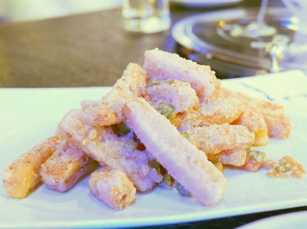 illustrative photo of the sweet potato fries with salted egg yolk at Seveni