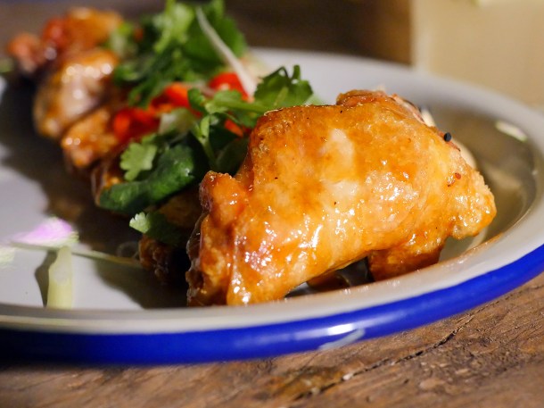 illustrative photo of the adobo-glazed chicken wings at Bong Bong's Manila Kanteen