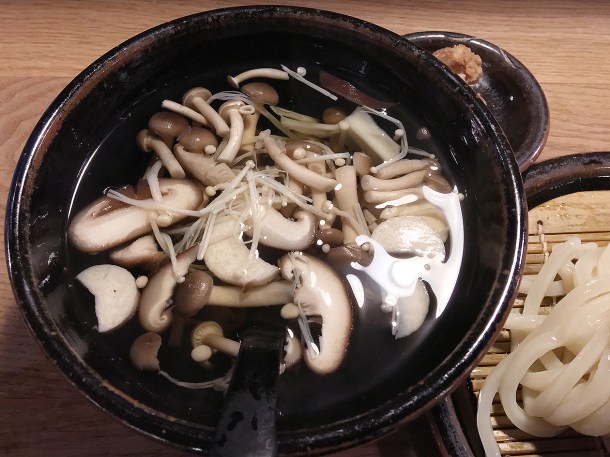 illustrative photo of the cold udon with hot broth and mushrooms with walnut miso at Koya City