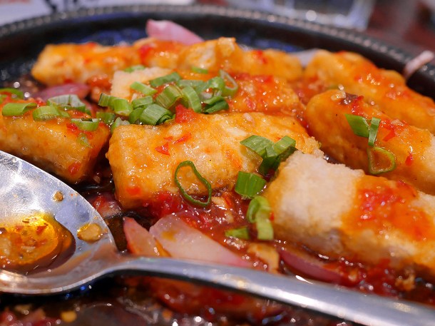 illustrative photo of the sizzling deep fried tofu in fish fragrant sauce at Tofu Vegan