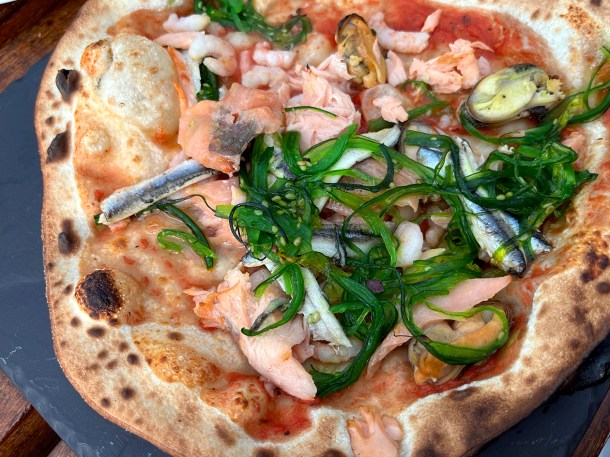illustrative photo of a 9in seafood pizza at Cafe Sia