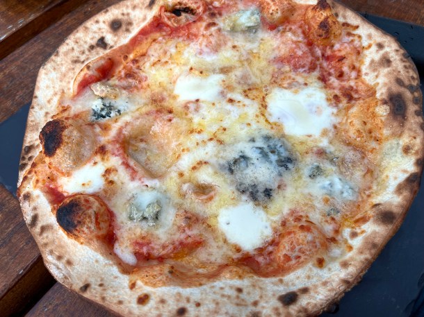 illustrative photo of the six cheese pizza at Cafe Sia
