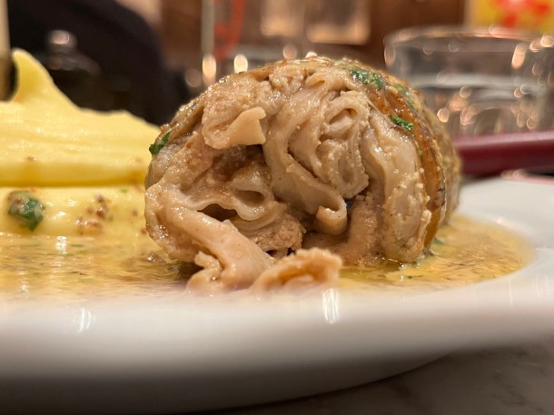 illustrative photo of the cut-open tripe sausage at Josephine Bouchon
