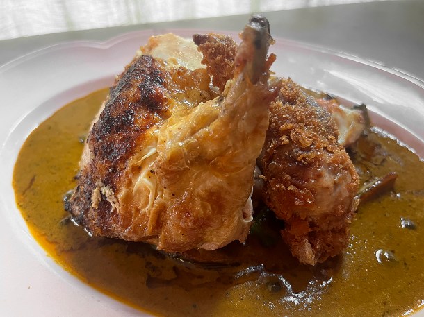 illustrative photo of the chicken in Cafe de Paris butter at Camille