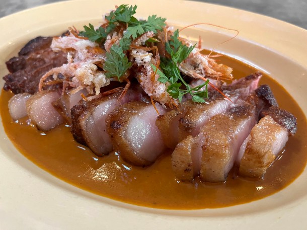 illustrative photo of the pork chop in prawn head sauce at Camille